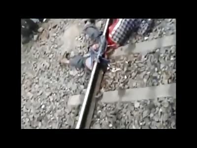 Short Video of Man Hit by Train still Alive taking his Final Gasps 