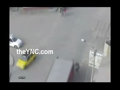 Idiot Trying to Jump on the Side of a Truck is Crushed When his Attempt Fails Miserably 