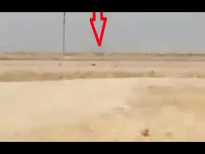 ISIS Terrorist Crawling next to IED is Blown to Bits by Machine Gunner 