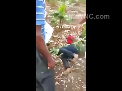 Thief in Red Shirt is Beaten in a Field Instant Justice Style