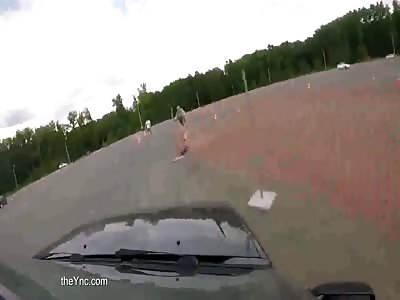 Race Driver Loses Control and Hits the Onlooker (Slo-mo)
