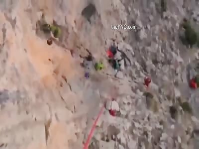 Guy On A Cliff Lets Go With Lifeline Attached Causing Him A World of Hurt