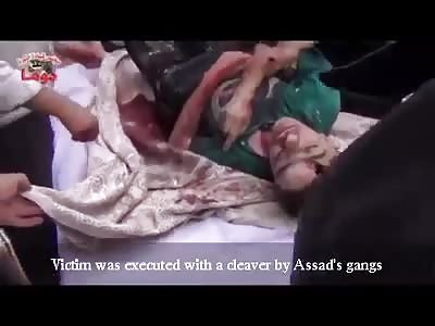 Assad Gangs Execute Man with Cleaver (Aftermath) vid is 2012 