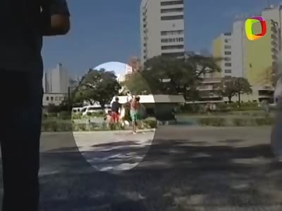 DIRECT FROM BRAZIL: Police officer kicks the child's face who showered in the public square