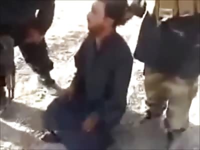 New Video from ISIS shows Violent Beheading of a Scared Man After Brief Interrogation