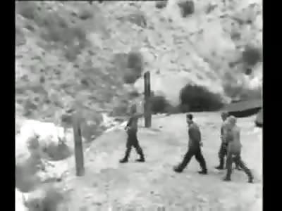Some nazis being executed by firing squad
