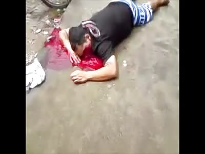 Man Lays Dead on Sidewalk Killed by Shotgun to the Face
