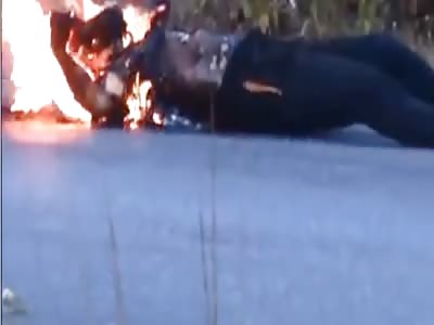 Just another dead rider burning on the road
