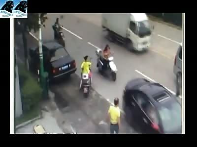 Bad driver 1: misses his turn, hits 4 pedestrians and a few vehicles!!