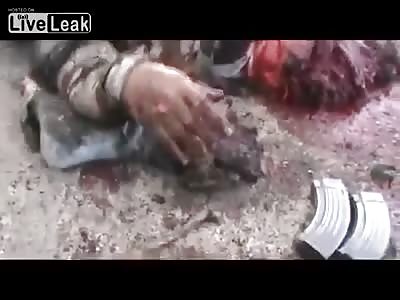 ** very Graphic**....FSA terrorist drinking water for the last time  