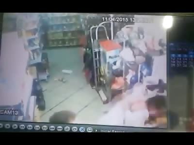 Thief is Dragged Out of Store and Pile Drived into the Concrete Street 