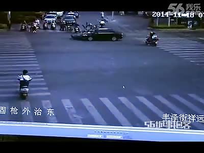Scooter Rider and Passenger Struck by Car 