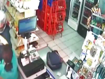 Female Store Clerk tries Fighting Robbers and Ends up on the Losing End of That 