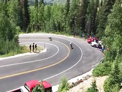 Watch out for that Car...Cyclist Runs into Porsche during Race