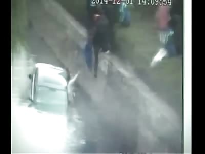 Woman crashes car into river.