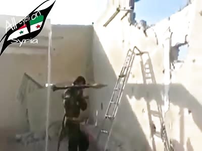 Soldier firing on Syrian rebels.