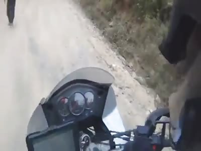 Guatemala: Couple on motorbike robbed.