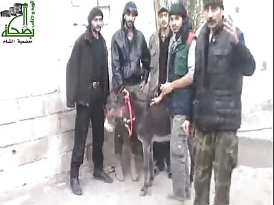 Mujahideen kill a donkey to eat meat.