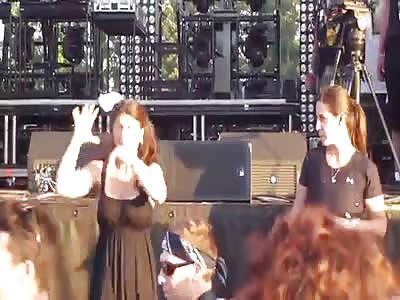 Girl Kills it with Sign Language at a WU TANG Concert