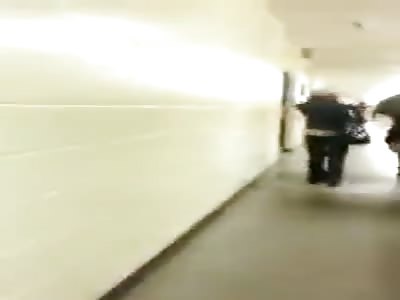 Guy Attacked from Behind Walking in School Hallway