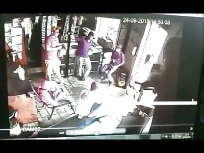 Man Sitting in Chair Talking with 5 Co-Workers is BRUTALLY Executed with 5 Shots to the Head