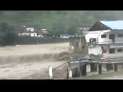 Man trapped in collapsing house washed away by sudden flood with villagers watching helplessly