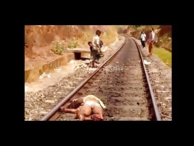 Man and his Son Killed by Train in this Gory Video