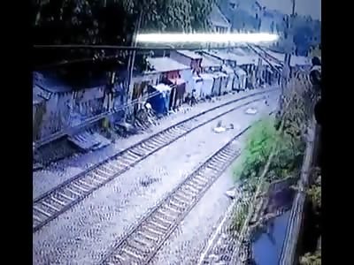Little Kid Not Fast Enough Hit by Train While Running Down the Tracks
