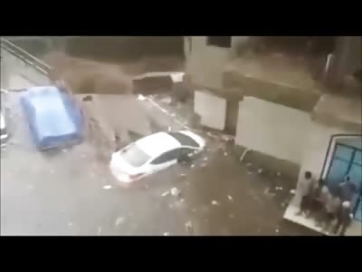 During Flood, Man Jumps From his Car but is Dragged Away by Current and Killed