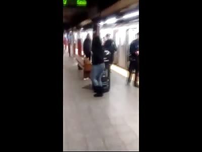 Woman Antagonizes a Man on a Subway .... Police Pepper spray the Man