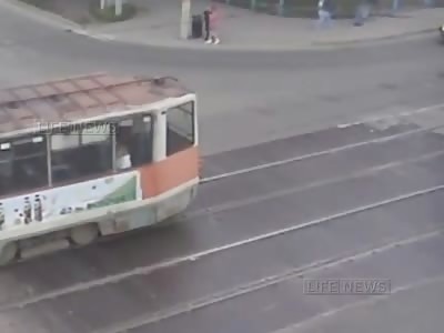 Pedestrians Horrlbly Crushed Under Tram