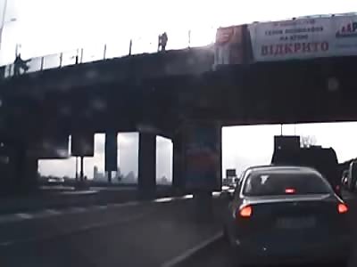 Girl jumps off the Bridge over Highway in Ukraine to her Death
