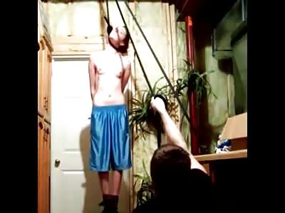 Man Practices Hanging His Topless Girlfriend