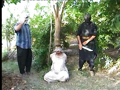 AQI beheading a Shia male in Iraq 2008