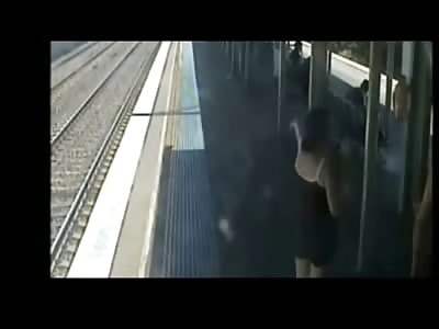 Scumbag Swings Child in Front of Train