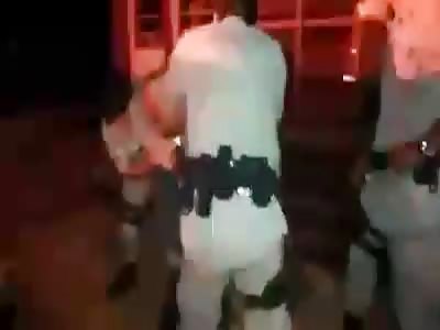 Brazilian police, exorcising a bandit