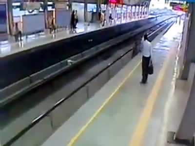 man under a metro train