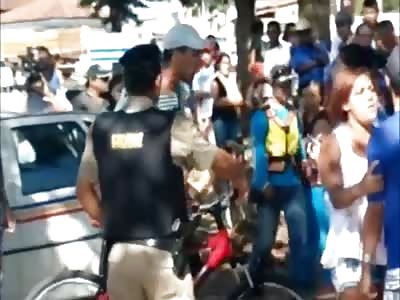 (05/15/2014) Wife's lover NEARLY BEHEADED by angry husband with a machete, on Brazil streets