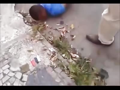 *BRAZIL* Crying thug beaten up by locals for robbing and beating woman