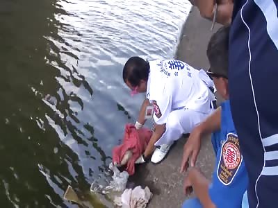 baby thrown into the river