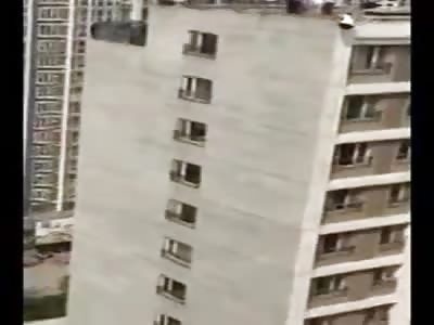 Women falls off top of building over cheating husband