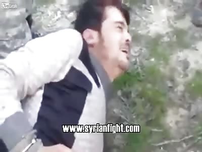 Footage showing the beheading of a civilian in Idlib