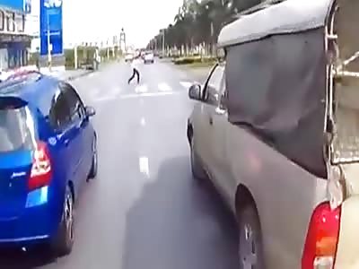 WOMAN IS RUN OVER BY MOTORCYCLE