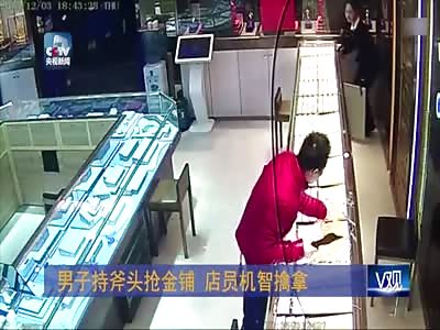 BRAVE EMPLOYEE AT GOLD SHOP SUBDUES AXE-WIELDING ROBBER