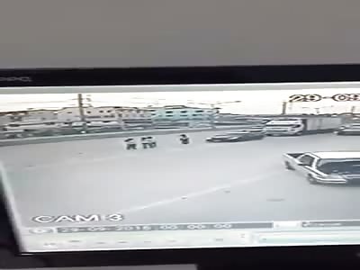 WOMAN IS RUN OVER BY CAR