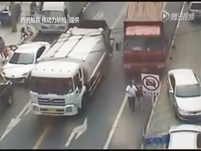 SHOCKING: COUPLE IS RUN OVER BY TRUCK IN CHINA