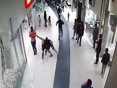 MAN BODY SLAMS THIEF RUNNING FROM SECURITY GUARDS