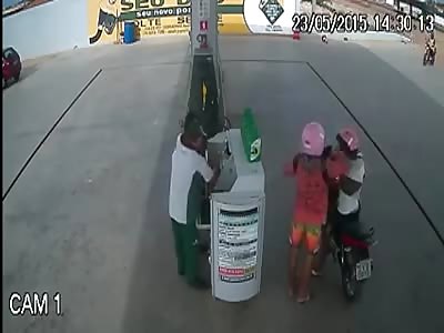 GAS STATION SECURITY GUARD SHOOTS AT ROBBERS