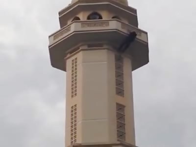 MAN JUMPS FROM MOSQUE TOWER
