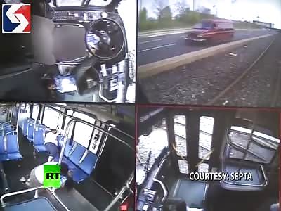 DRIVER FALLS OUT OF SEAT AND BUS NEARLY HITS TRAIN